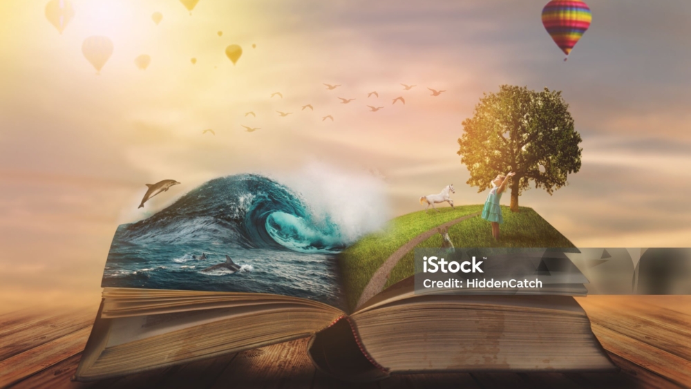 Concept of an open magic book; open pages with water and land and small child. Fantasy, nature or learning concept, with copy space